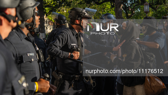 Pro-Palestine protesters are attempting to establish an occupation in Alumni Park on the University of Southern California campus in Los Ang...