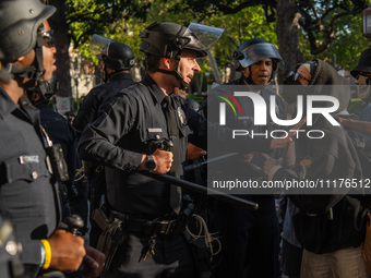 Pro-Palestine protesters are attempting to establish an occupation in Alumni Park on the University of Southern California campus in Los Ang...