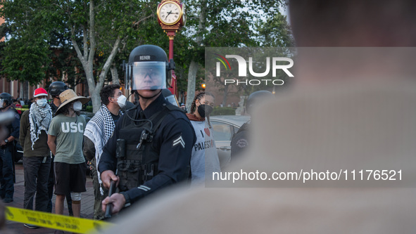 Pro-Palestine protesters are attempting to establish an occupation in Alumni Park on the University of Southern California campus in Los Ang...