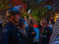 Pro-Palestine protesters are attempting to establish an occupation in Alumni Park on the University of Southern California campus in Los Ang...