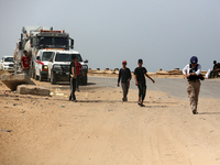 United Nations (UN) and World Health Organization (WHO) aid trucks are waiting for Israel's permission to enter Gaza in Gaza Valley, on Apri...