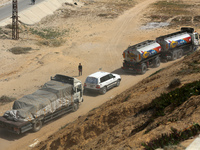 United Nations (UN) and World Health Organization (WHO) aid trucks are waiting for Israel's permission to enter Gaza in Gaza Valley, on Apri...