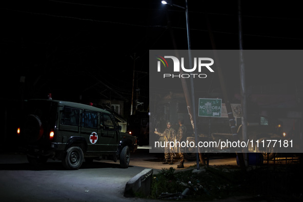 Security forces are near the encounter site where a conflict is ongoing between militants and Indian troops in Nowpora Sopore, Jammu and Kas...