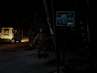 Security forces are near the encounter site where a conflict is ongoing between militants and Indian troops in Nowpora Sopore, Jammu and Kas...