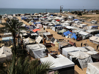 Palestinians are taking shelter in a tent camp in Deir Balah in the central Gaza Strip on April 26, 2024, as they flee their homes due to Is...