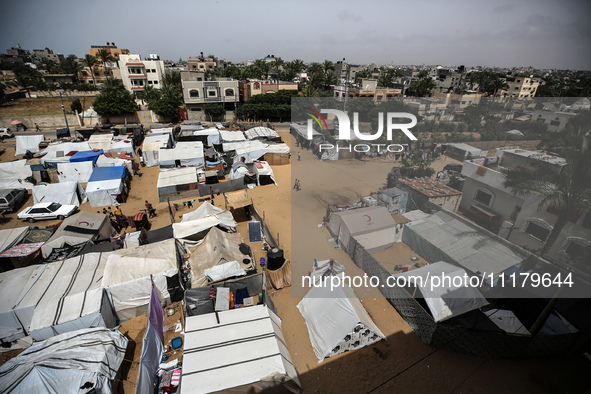 Palestinians are taking shelter in a tent camp in Deir Balah in the central Gaza Strip on April 26, 2024, as they flee their homes due to Is...