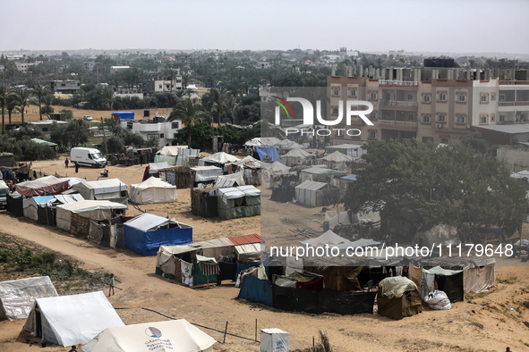 Palestinians are taking shelter in a tent camp in Deir Balah in the central Gaza Strip on April 26, 2024, as they flee their homes due to Is...