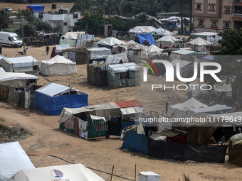 Palestinians are taking shelter in a tent camp in Deir Balah in the central Gaza Strip on April 26, 2024, as they flee their homes due to Is...