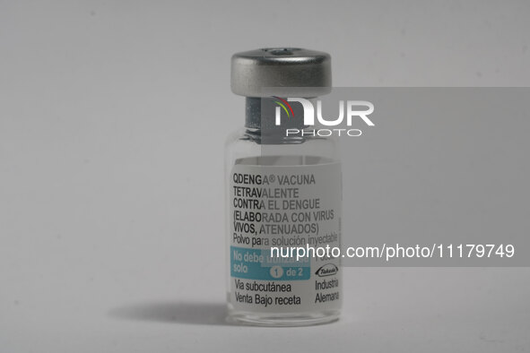 A vial of the German-made Qdenga vaccine is being displayed. Discussions are intensifying over dengue vaccination due to the lack of an offi...