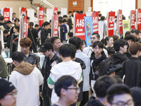 College students are choosing positions at a campus job fair in Huai'an, China, on April 27, 2024. (