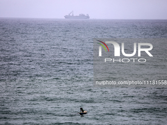 The ROY P. BENAVIDEZ (IMO: 9218210), a Logistics Naval Vessel flying the flag of the USA, is currently anchored off the coast of the Wadi Ga...