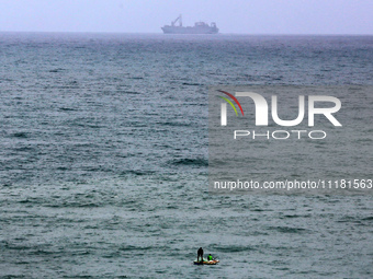 The ROY P. BENAVIDEZ (IMO: 9218210), a Logistics Naval Vessel flying the flag of the USA, is currently anchored off the coast of the Wadi Ga...