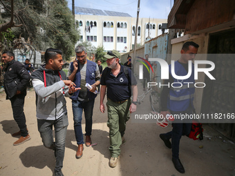 Simon Elmont from Humanity and Inclusion UK is examining and tagging large Israeli unexploded weapons to try to ensure maximum safety in Dei...