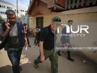 Simon Elmont from Humanity and Inclusion UK is examining and tagging large Israeli unexploded weapons to try to ensure maximum safety in Dei...