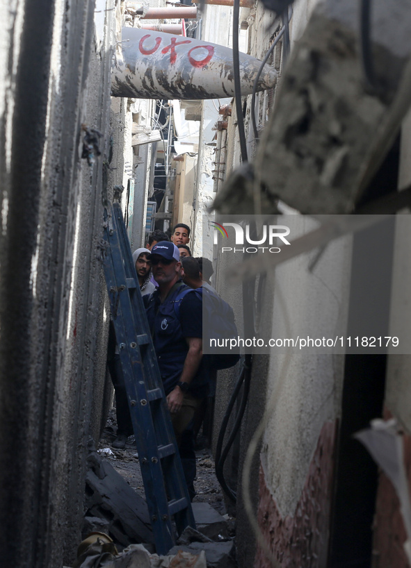 Members of Humanity and Inclusion UK are examining and marking significant Israeli unexploded weapons to try to ensure maximum safety in Dei...