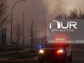 EDMONTON, CANADA - APRIL 22:
Emergency services at the scene as firefighters relentlessly combat flames that tore through Edmonton's histori...