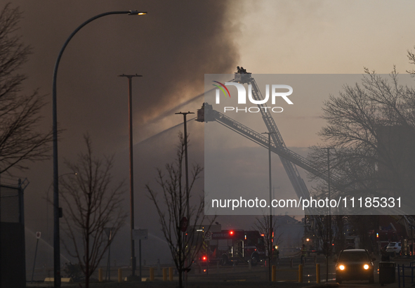 EDMONTON, CANADA - APRIL 22:
Emergency services at the scene as firefighters relentlessly combat flames that tore through Edmonton's histori...