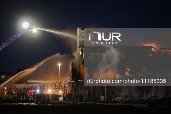 EDMONTON, CANADA - APRIL 22:
Firefighters relentlessly combat flames that tore through Edmonton's historic Hangar 11 on Monday evening, on A...