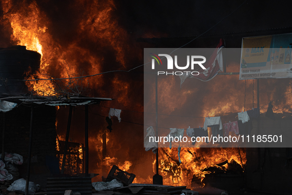 A fire is ravaging a vehicle workshop and adjacent shops in Sankhamul, Kathmandu, causing extensive damage on a Sunday afternoon. 