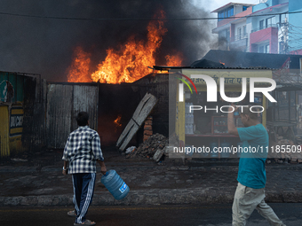 A fire is ravaging a vehicle workshop and adjacent shops in Sankhamul, Kathmandu, causing extensive damage on a Sunday afternoon. (