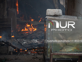 A fire is ravaging a vehicle workshop and adjacent shops in Sankhamul, Kathmandu, causing extensive damage on a Sunday afternoon. (