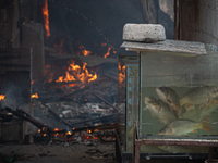 A fire is ravaging a vehicle workshop and adjacent shops in Sankhamul, Kathmandu, causing extensive damage on a Sunday afternoon. (