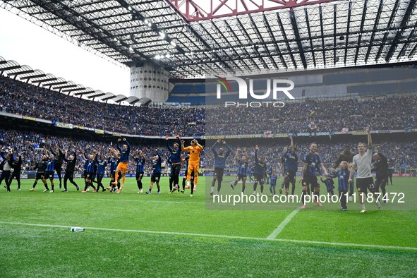 Inter FC players are greeting the supporters at the end of the match following the Italian Serie A football match between Inter FC Internazi...