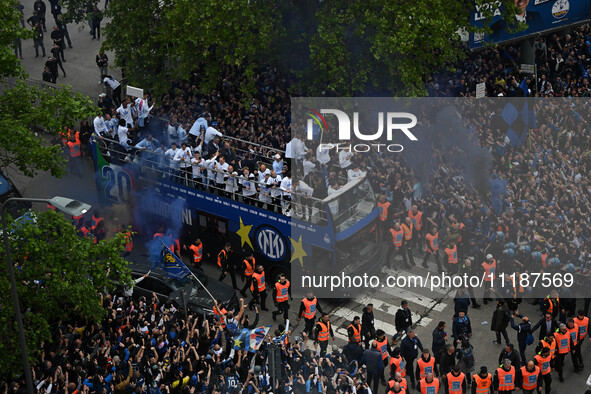 Inter FC players are celebrating their victory with fans during their bus parade, making a stop to celebrate on stage at the San Siro Stadiu...