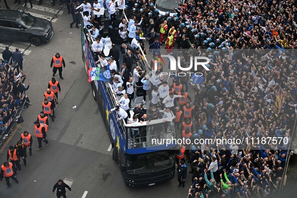 Inter FC players are celebrating their victory with fans during their bus parade, making a stop to celebrate on stage at the San Siro Stadiu...