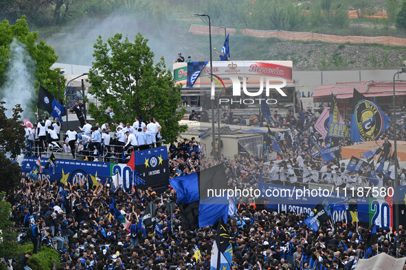 Inter FC players are celebrating their victory with fans during their bus parade, making a stop to celebrate on stage at the San Siro Stadiu...