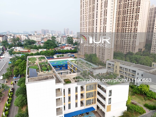 In Nanning, China, on April 28, 2024, the ''sky vegetable garden + garden'' on the roof of a primary school is providing teachers and studen...