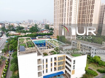 In Nanning, China, on April 28, 2024, the ''sky vegetable garden + garden'' on the roof of a primary school is providing teachers and studen...