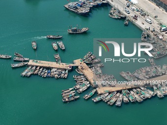 Fishing boats are returning to a fishing port to prepare for a fishing ban in Yantai, Shandong Province, China, on April 29, 2024. From 12 o...