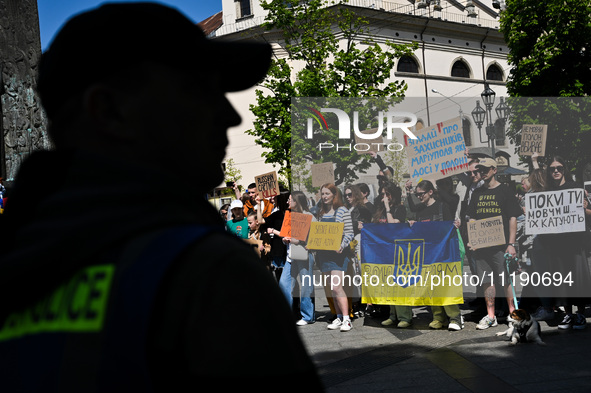 Participants are holding flags and placards in support of the military held in Russian captivity during the FreeAzov action at the Taras She...