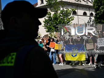 Participants are holding flags and placards in support of the military held in Russian captivity during the FreeAzov action at the Taras She...