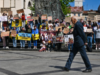 Participants are holding placards in support of the military held in Russian captivity during the FreeAzov action at the Taras Shevchenko mo...