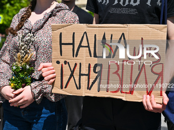 A placard is being displayed during the FreeAzov action in support of the military held in Russian captivity, at the square by the Taras She...