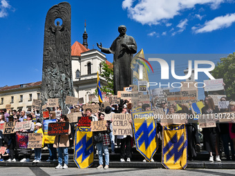 Participants are holding placards in support of the military detained in Russian captivity during the FreeAzov action at the Taras Shevchenk...