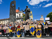 Participants are holding placards in support of the military detained in Russian captivity during the FreeAzov action at the Taras Shevchenk...