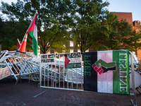 The sun rises on a Gaza solidarity encampment at George Washington University, Washington, DC, April, 29, 2024.  Overnight, students broke t...