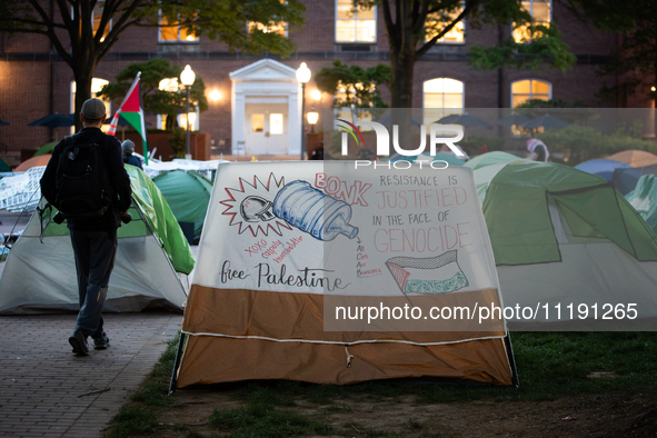 The sun rises on the Gaza solidarity encampment at George Washington University, Washington, DC, April 29, 2024.  GWU students have maintain...