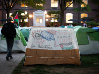 The sun rises on the Gaza solidarity encampment at George Washington University, Washington, DC, April 29, 2024.  GWU students have maintain...