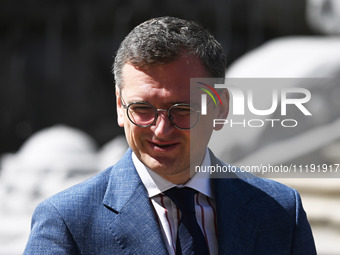 Ukrainian Foreign Minister Dmytro Kuleba is seen before a press conference with NATO Secretary General Jens Stoltenberg and President of Ukr...