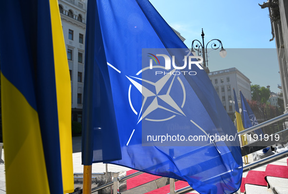 Flags of Ukraine and NATO are seen before a press conference of NATO Secretary General Jens Stoltenberg and President of Ukraine Volodymyr Z...