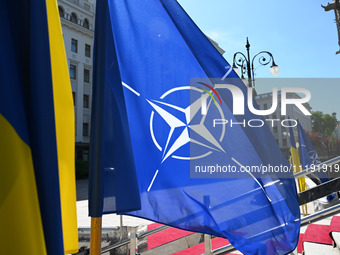 Flags of Ukraine and NATO are seen before a press conference of NATO Secretary General Jens Stoltenberg and President of Ukraine Volodymyr Z...