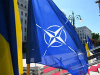 Flags of Ukraine and NATO are seen before a press conference of NATO Secretary General Jens Stoltenberg and President of Ukraine Volodymyr Z...