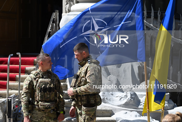 Flags of Ukraine and NATO are seen before a press conference of NATO Secretary General Jens Stoltenberg and President of Ukraine Volodymyr Z...