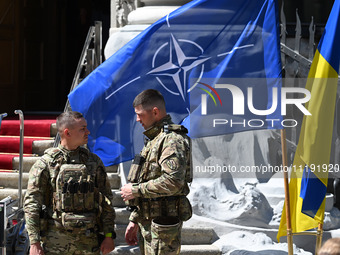 Flags of Ukraine and NATO are seen before a press conference of NATO Secretary General Jens Stoltenberg and President of Ukraine Volodymyr Z...