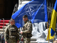 Flags of Ukraine and NATO are seen before a press conference of NATO Secretary General Jens Stoltenberg and President of Ukraine Volodymyr Z...