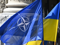 Flags of Ukraine and NATO are seen before a press conference of NATO Secretary General Jens Stoltenberg and President of Ukraine Volodymyr Z...